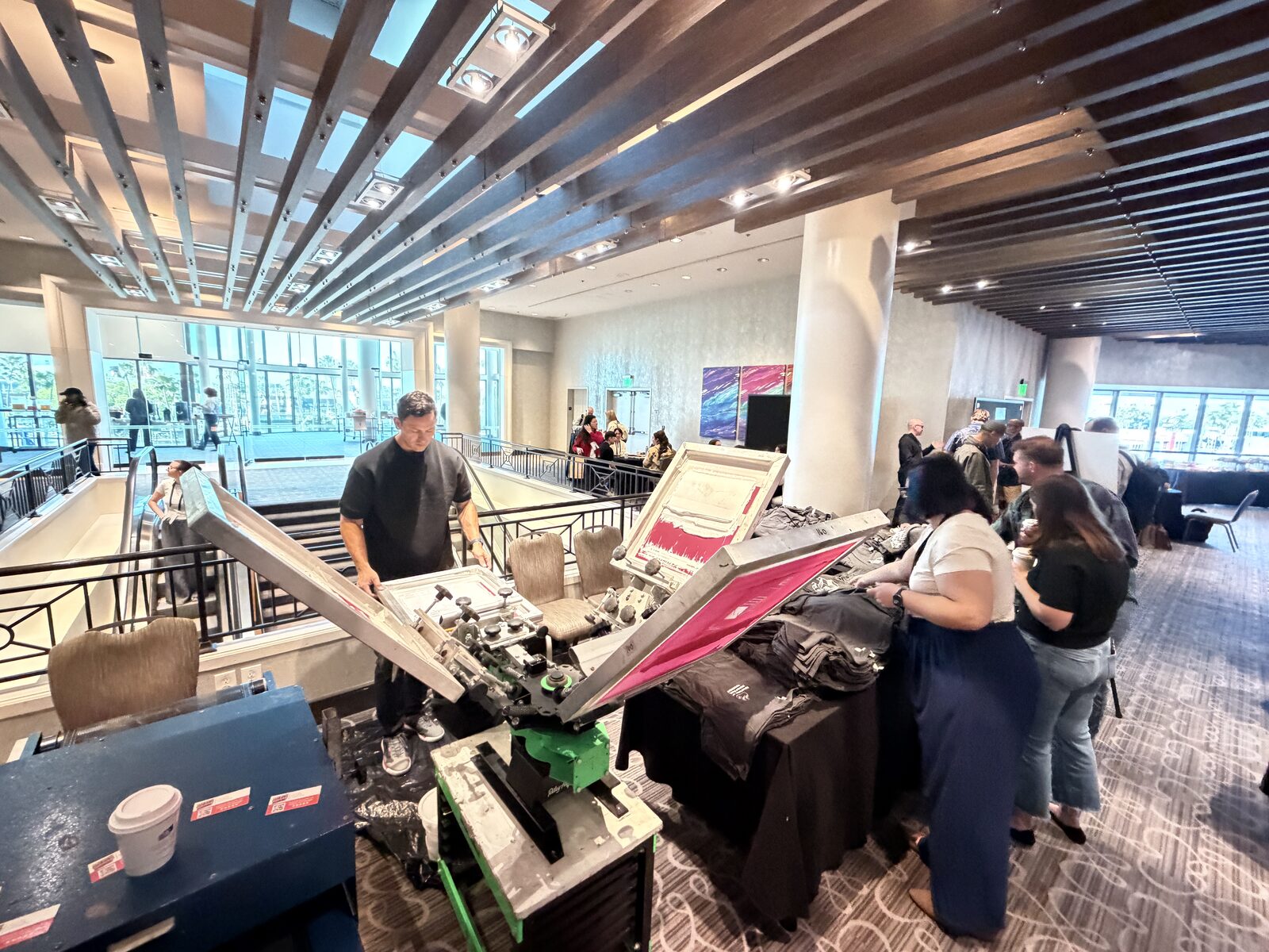 Live printing station set up inside a hotel conference exhibit space